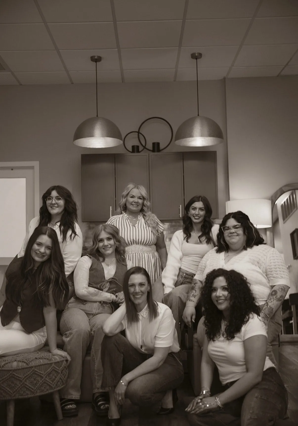 The Emerald Salon & Suites team of stylists at their boutique hair salon in Hiawatha, Iowa, near Cedar Rapids